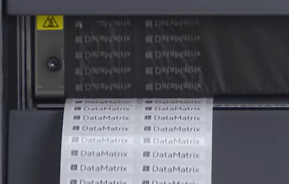 Thermal transfer printer printing high-resolution DataMatrix barcode labels on synthetic media Thermal transfer printer printing high-resolution DataMatrix barcode labels on synthetic media